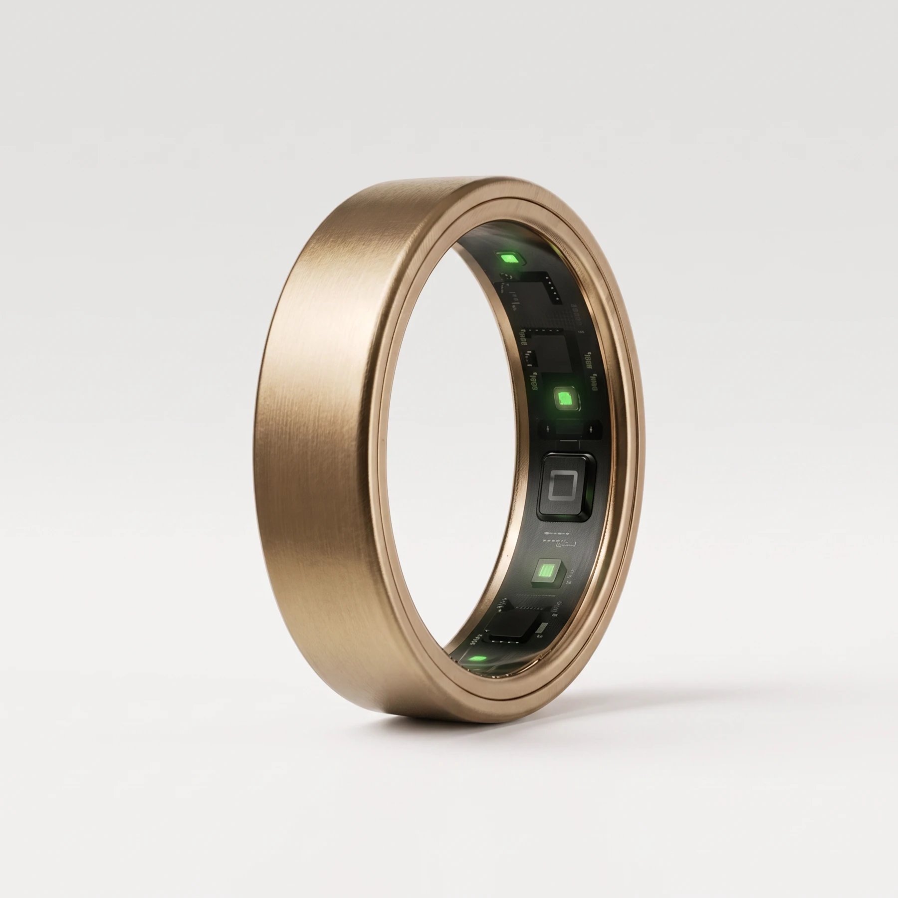 UbiRing in Solar Gold: a brushed champagne titanium band, its inner sensor array lit green through the opening.
